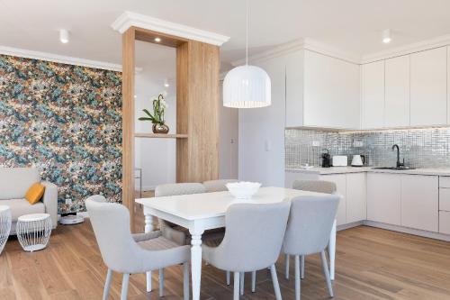 Η κουζίνα ή μικρή κουζίνα στο Apartamenty The View Gardenia