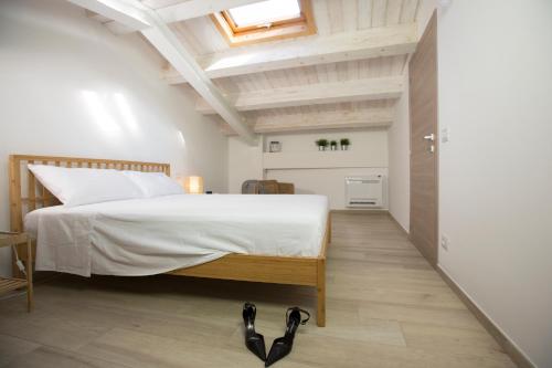 Cama o camas de una habitación en Funduq ospitalità iblea