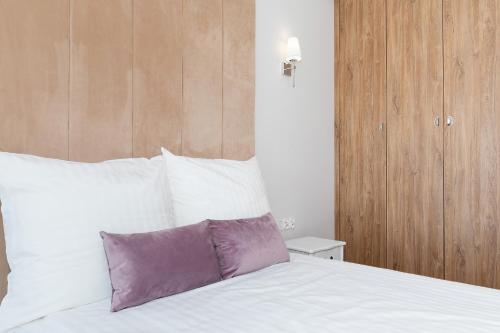 Ένα ή περισσότερα κρεβάτια σε δωμάτιο στο Apartamenty The View Gardenia
