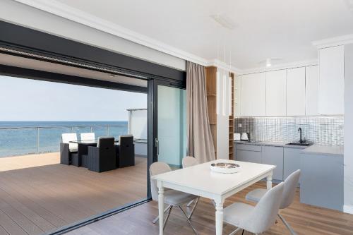 Η κουζίνα ή μικρή κουζίνα στο Apartamenty The View Gardenia