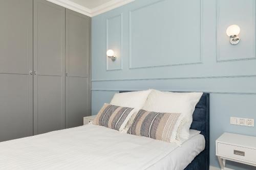 Ένα ή περισσότερα κρεβάτια σε δωμάτιο στο Apartamenty The View Gardenia