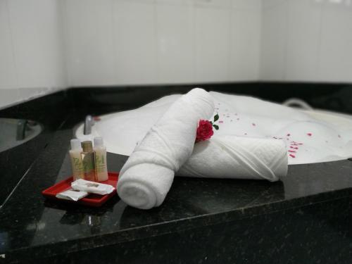 Postel nebo postele na pokoji v ubytování Refúgio das Rosas