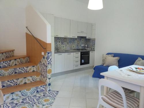 A kitchen or kitchenette at La finestra sul cortile