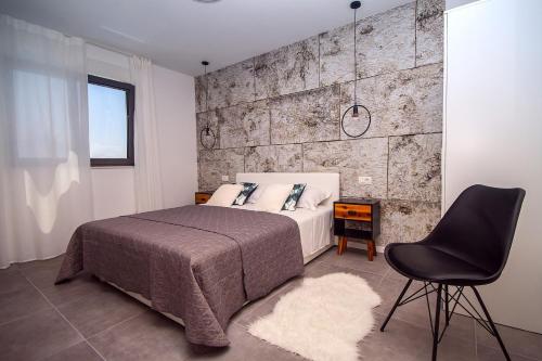 Postel nebo postele na pokoji v ubytování Villa Soriano
