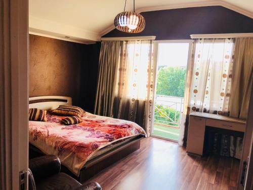 Llit o llits en una habitació de Giorgi Apartment