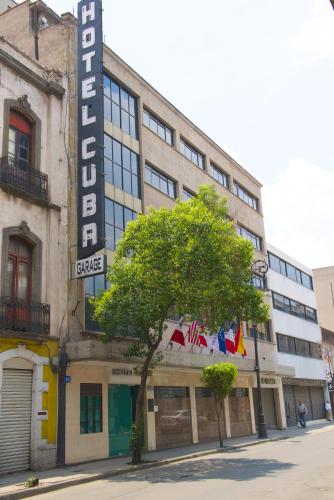 a building with a sign that reads hotel dances at Hotel Cuba in Mexico City
