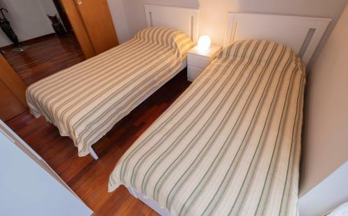 Ένα ή περισσότερα κρεβάτια σε δωμάτιο στο b&b Immacolata
