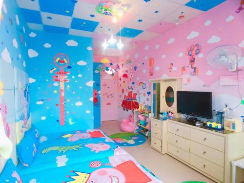 Habitación infantil con dormitorio temático Hello Kitty en Cape 42 Hotel Il, en Hengchun