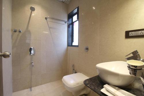 Kylpyhuone majoituspaikassa Hotel Shivam