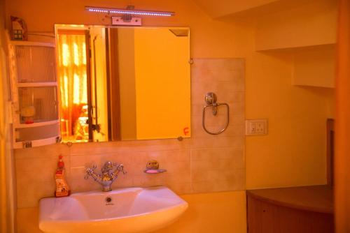 Ένα μπάνιο στο AMBIKA HOME STAY