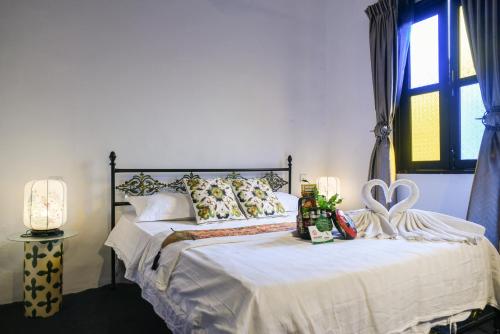 Letto o letti in una camera di Ohana House HQ