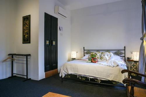 Letto o letti in una camera di Ohana House HQ