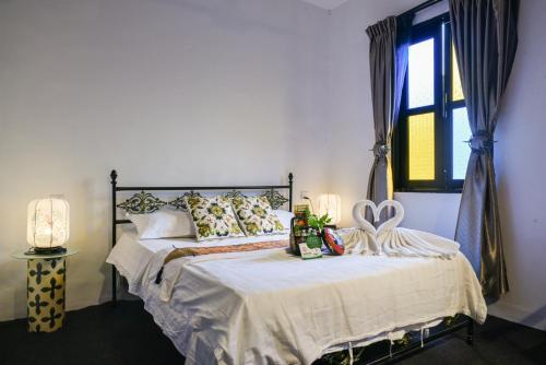 Letto o letti in una camera di Ohana House HQ