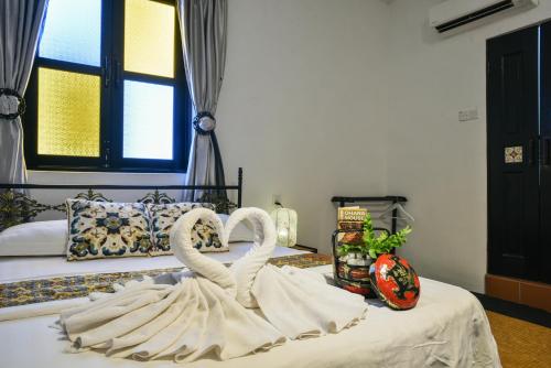 Letto o letti in una camera di Ohana House HQ