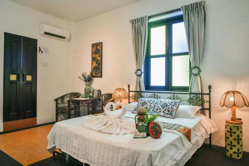 Letto o letti in una camera di Ohana House HQ