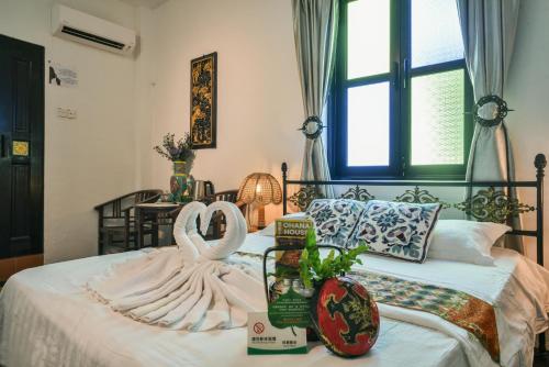 Letto o letti in una camera di Ohana House HQ
