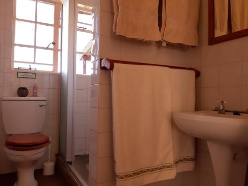Ванная комната в Dabchick Cottage