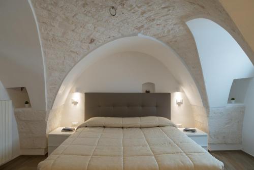 Säng eller sängar i ett rum på Terrazza Primavera by Wonderful Italy