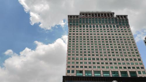 a tall building with a lot of windows at Niwill Homestay in Taichung