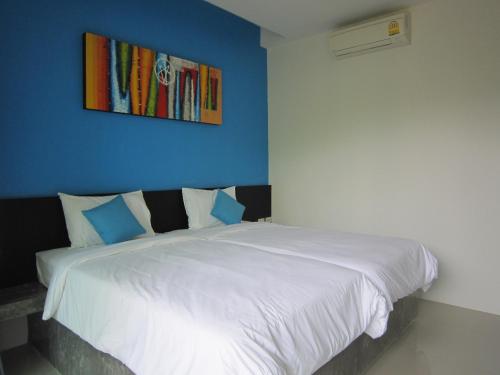 Postel nebo postele na pokoji v ubytování The Fong Krabi resort
