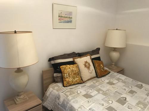 Postel nebo postele na pokoji v ubytování Luxueuse villa piscine et jacuzzi