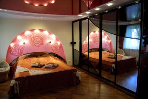 Кровать или кровати в номере Проспект Центральный 261