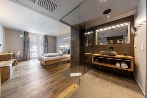 Ένα ή περισσότερα κρεβάτια σε δωμάτιο στο AKZENT Hotel Laupheimer Hof