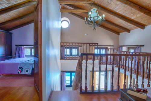 Ένα ή περισσότερα κρεβάτια σε δωμάτιο στο Amadryades Villas-Villa Terina