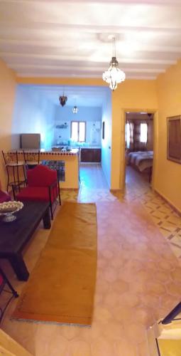 Un ou plusieurs lits dans un hébergement de l'établissement Hassilabiad Appart Hotel