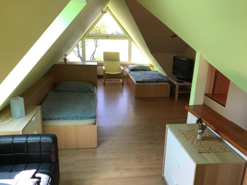Postel nebo postele na pokoji v ubytování Beach Pension