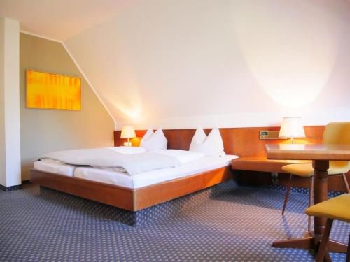 En eller flere senger på et rom på Stadthaus Valentin