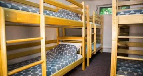 a bunk bed room with two bunk beds in it at Hostel Light in Odesa