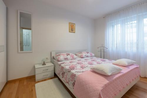 Postel nebo postele na pokoji v ubytování Fully renovated Apartment Grgo