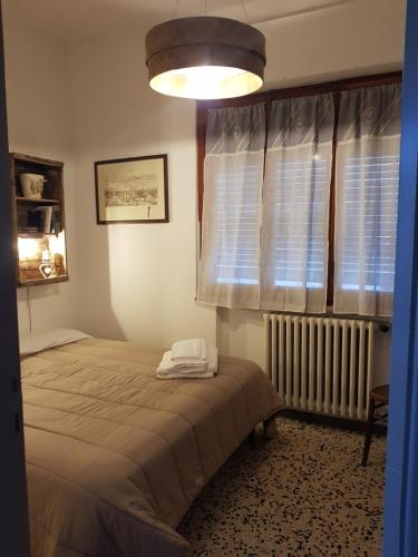 Postel nebo postele na pokoji v ubytování Casa Jole