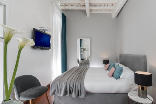Llit o llits en una habitació de Maison Giulia