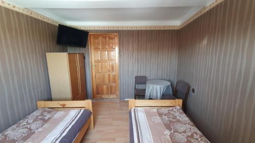 Ένα ή περισσότερα κρεβάτια σε δωμάτιο στο Pokoje do wynajęcia Piastowska