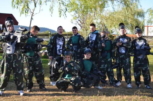 a group of men in uniforms posing for a picture at Pensiunea Popasul Iancului in Mărişel