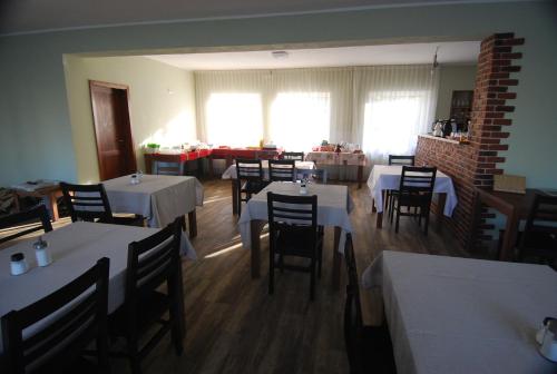 A restaurant or other place to eat at Ivanek guest house