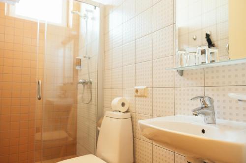 Ένα μπάνιο στο Hotel Vila Diemedis
