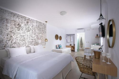 Кровать или кровати в номере Sarpidon Apartments