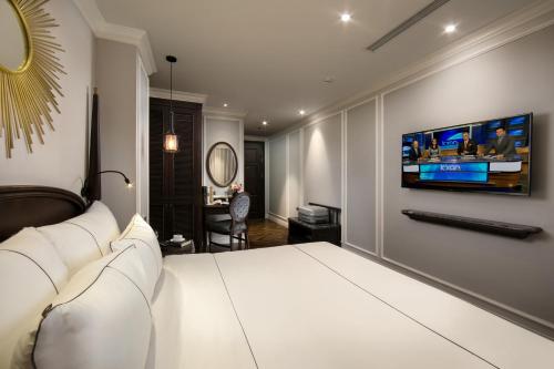 TV a/nebo společenská místnost v ubytování Canary Hotel