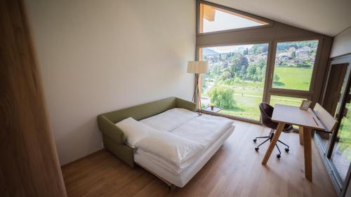 Кровать или кровати в номере Seaside-Lodge, Top Apartment