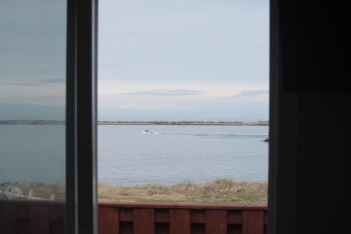 a view of a lake from a window at Robbins by the Sea in Bonavista
