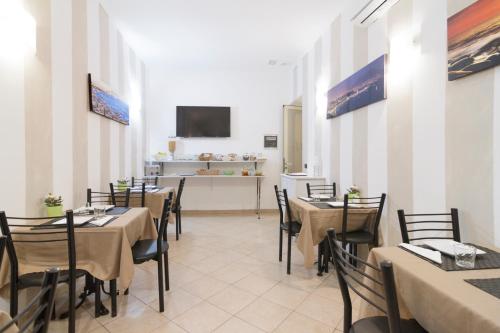 TV a/nebo společenská místnost v ubytování San Marco Hotel