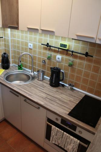 A kitchen or kitchenette at Very central cozy apartment