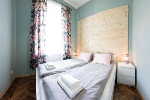 
Łóżko lub łóżka w pokoju w obiekcie Fresh Apartments
