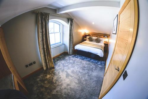 Katil atau katil-katil dalam bilik di MONO Suites Old Town