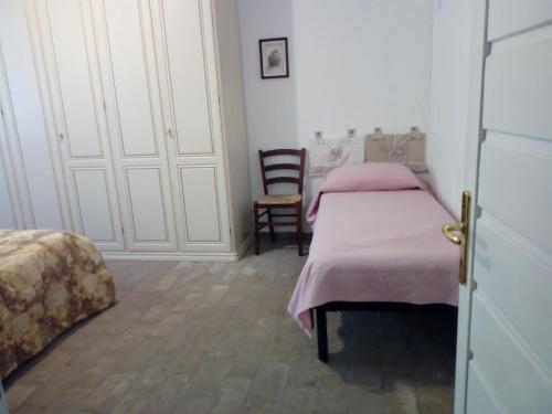 Katil atau katil-katil dalam bilik di Agriturismo Baratti