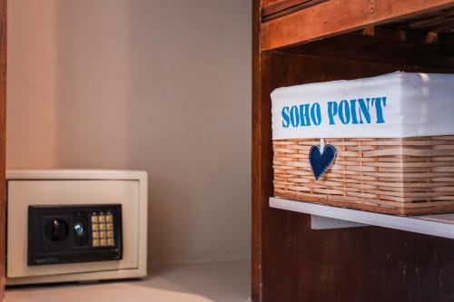 a sign for a sigma point oven in a room at Soho Point Central in Buenos Aires