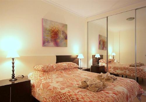 Cama o camas de una habitación en Marlenghi Apartments 8